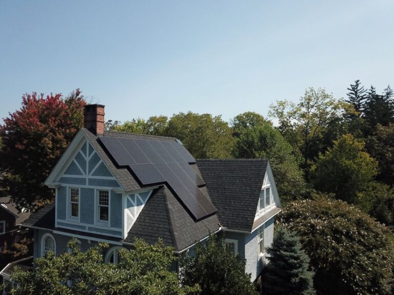 Solar panels on a roof of a large house