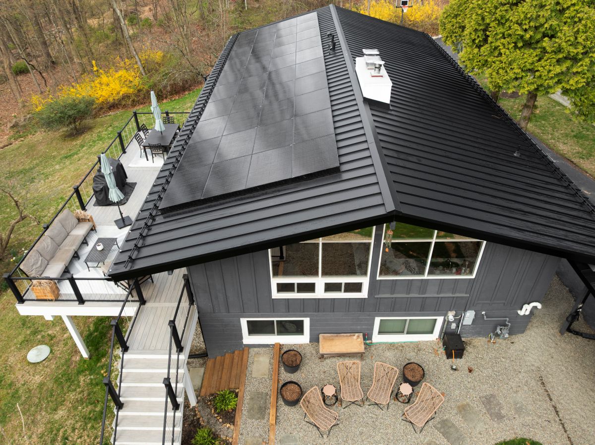 Metal roof with solar panels