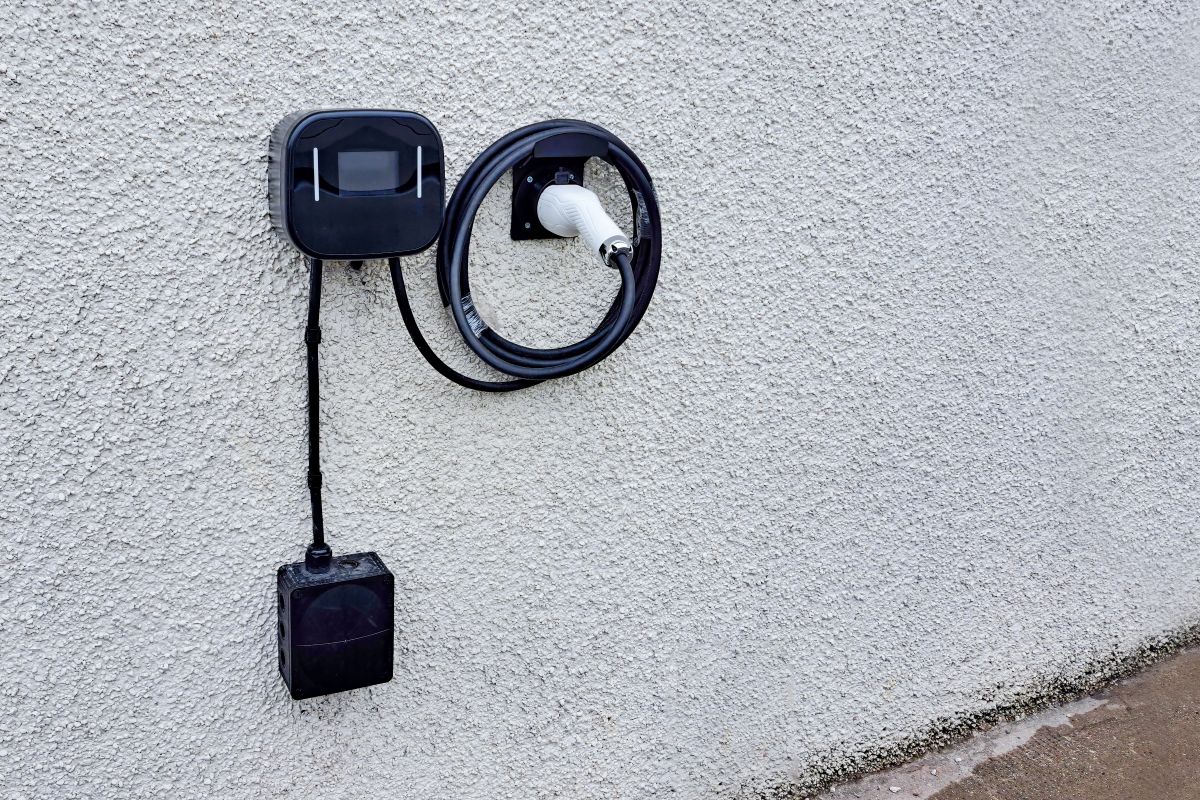 Home Electric Vehicle Charging Station Cable Point on White Exterior Wall