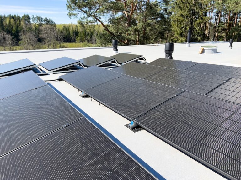 Photovoltaic system. Solar Panels on Flat Roof. Roof Solar Mounting System